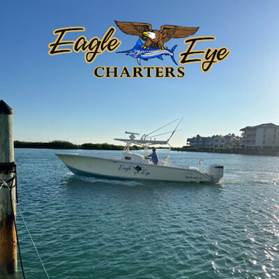 A motorboat named "Eagle Eye" is on the water, with "Eagle Eye Charters" logo featuring an eagle and fish above it. Background has buildings and sky.