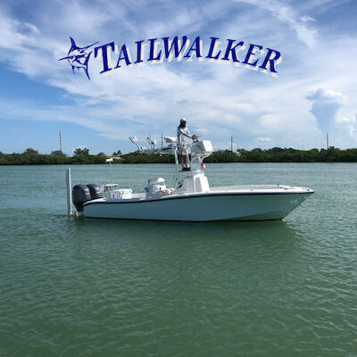 A boat on calm water with the word "TAILWALKER" and an image of a swordfish or marlin above it against a blue sky background.